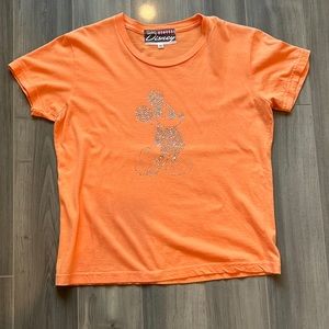 Vintage Disney t-shirt in orange color with Micky.